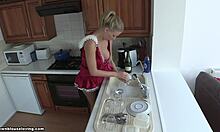 Red get-up blonde GF doing the dishes, looking hot